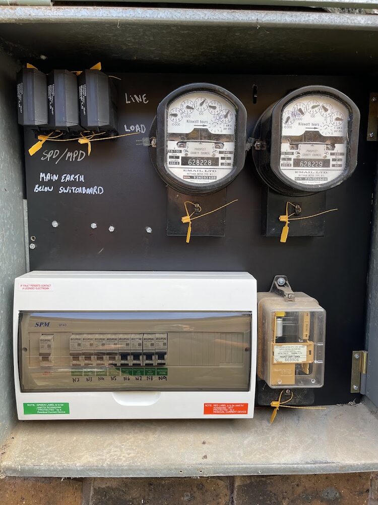 Dual meter switchboard fitted with a new breaker enclosure